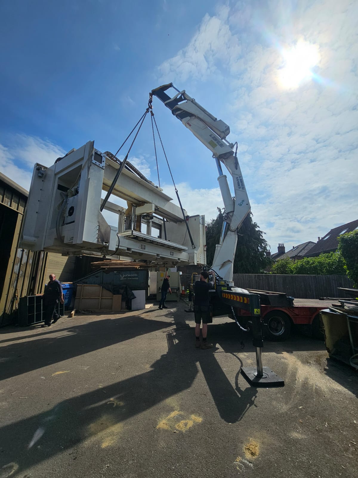 ILEX Machinery team moving industrial equipment safely